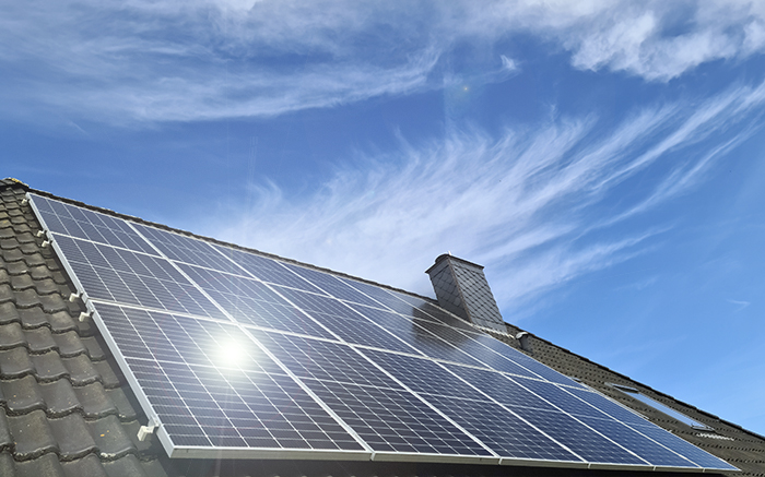 Solar panels on the roof of houses. Green energy